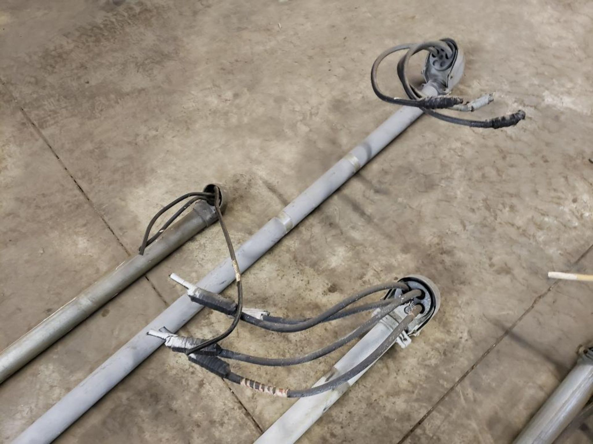 Large assortment of meter bases, risers with wire, and lighting. - Image 10 of 12