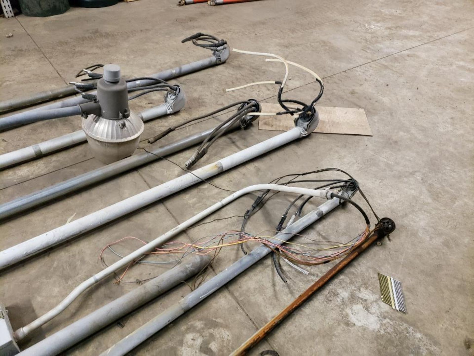 Large assortment of meter bases, risers with wire, and lighting. - Image 2 of 12