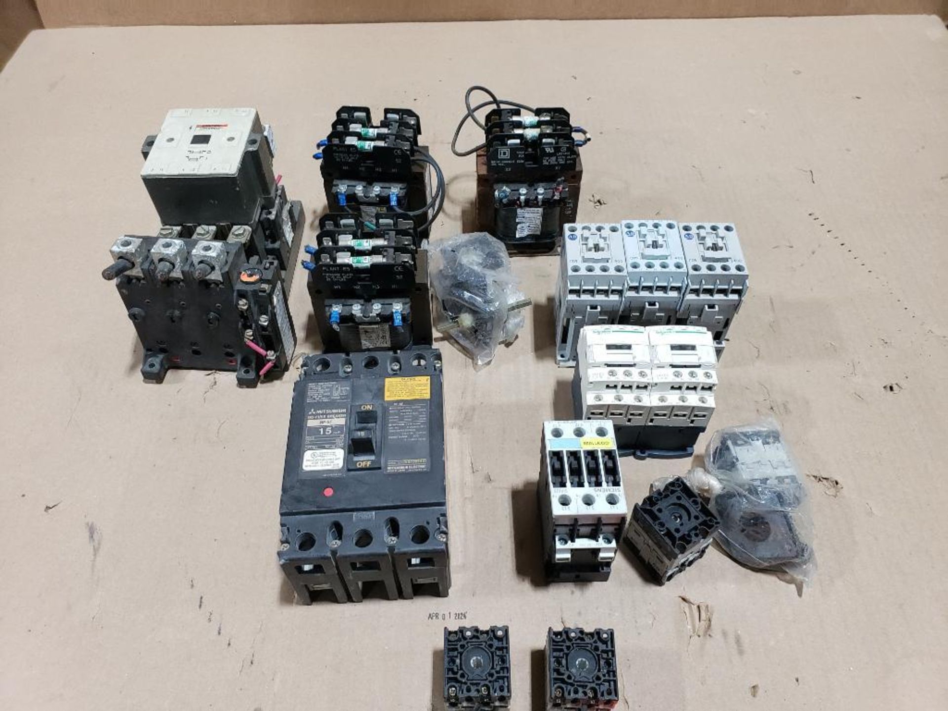 Assorted electrical contactor, breaker, transformer. Square-D, Allen Bradley, Mitsubishi.