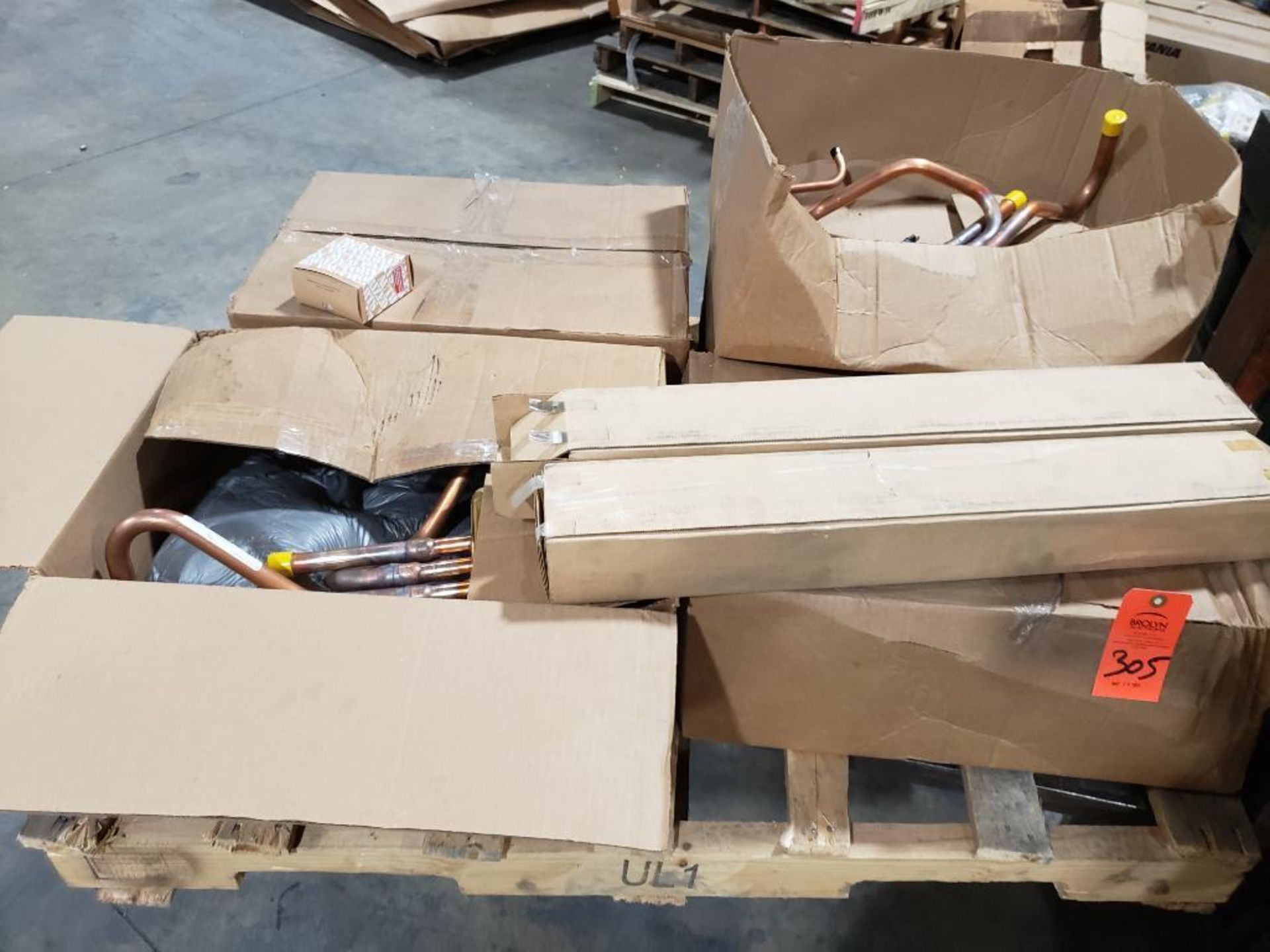 Pallet of assorted hardware and parts. Copper valve manifolds, etc.