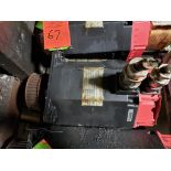 Fanuc AC servo motor. Part number A06B-0142-B076.