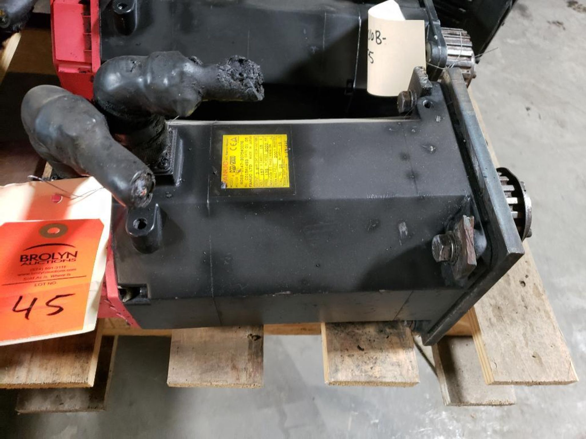 Fanuc AC servo motor. Part number A06B-0147-B075.