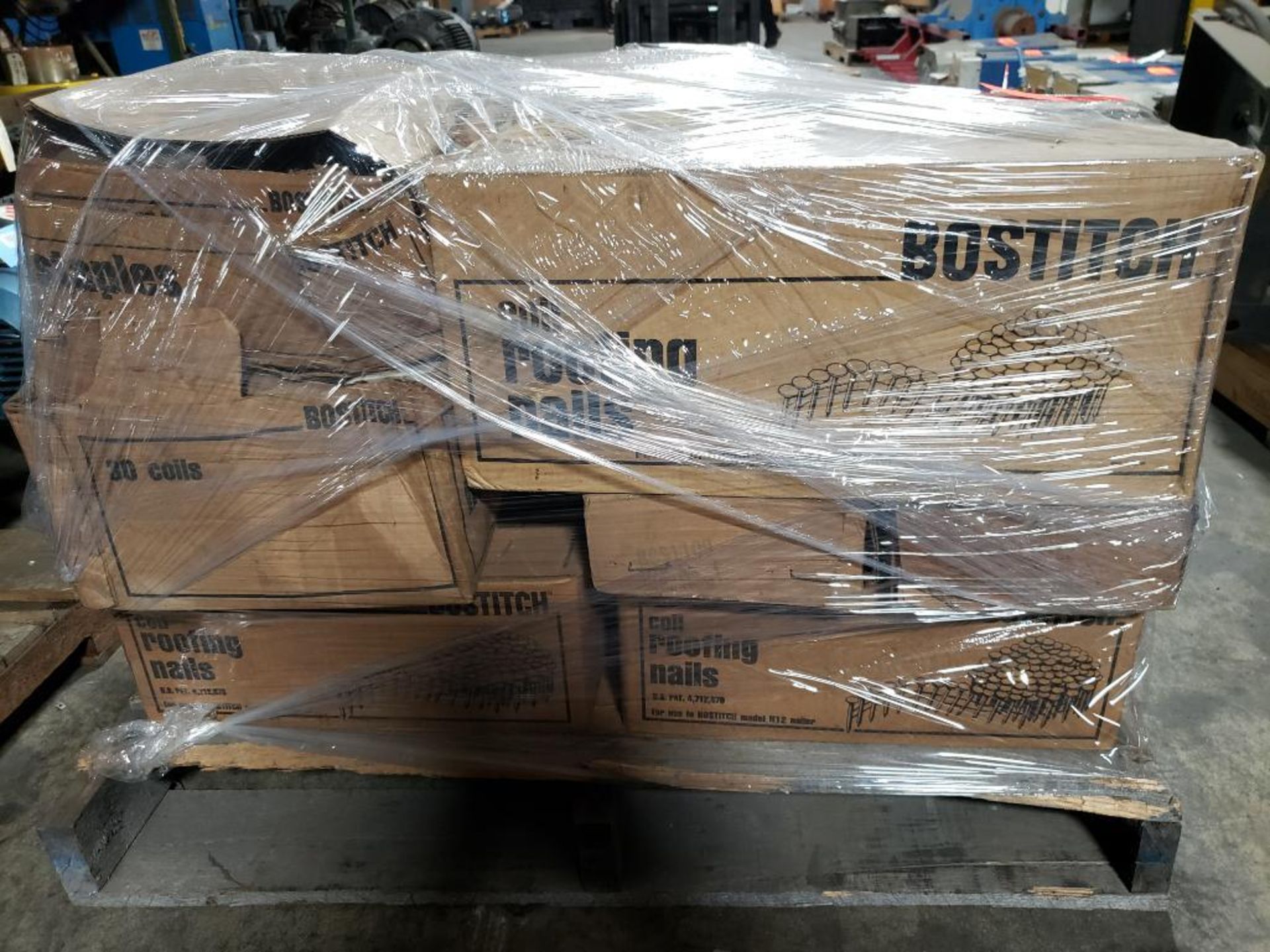 Pallet of Bostich coil roofing nails.