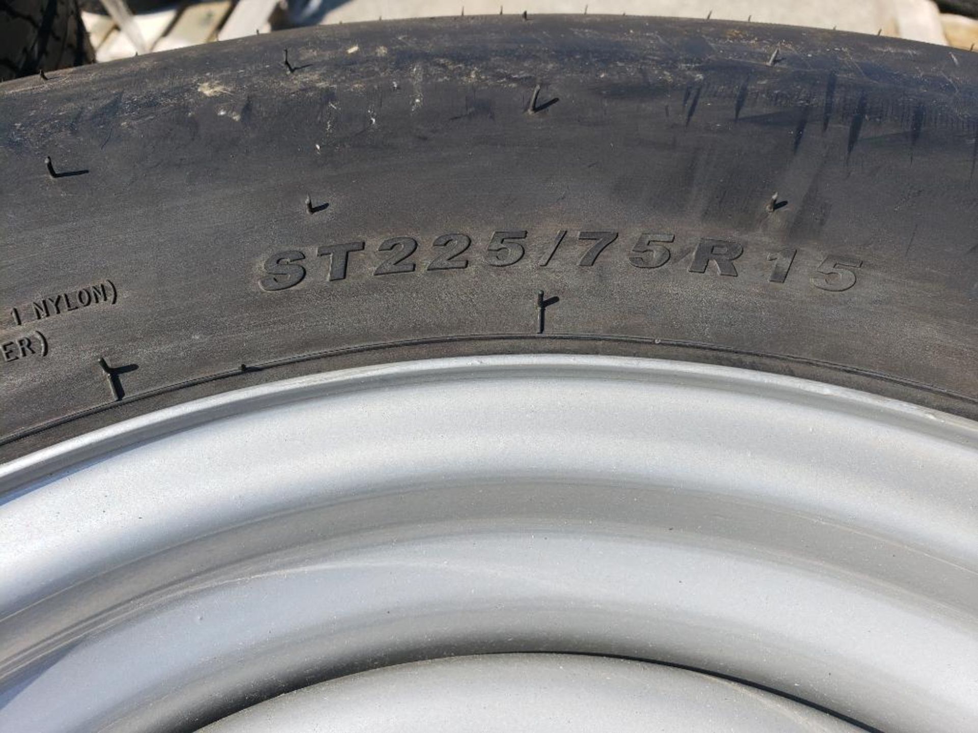 Qty 12 - Trailer wheel. 15in steel rim. 6x5.5 bolt pattern. Granstellar 225/75R15. New old stock. - Image 2 of 4