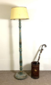 A vintage leather stick stand, with gilt decoration; together with two canes and a vintage '