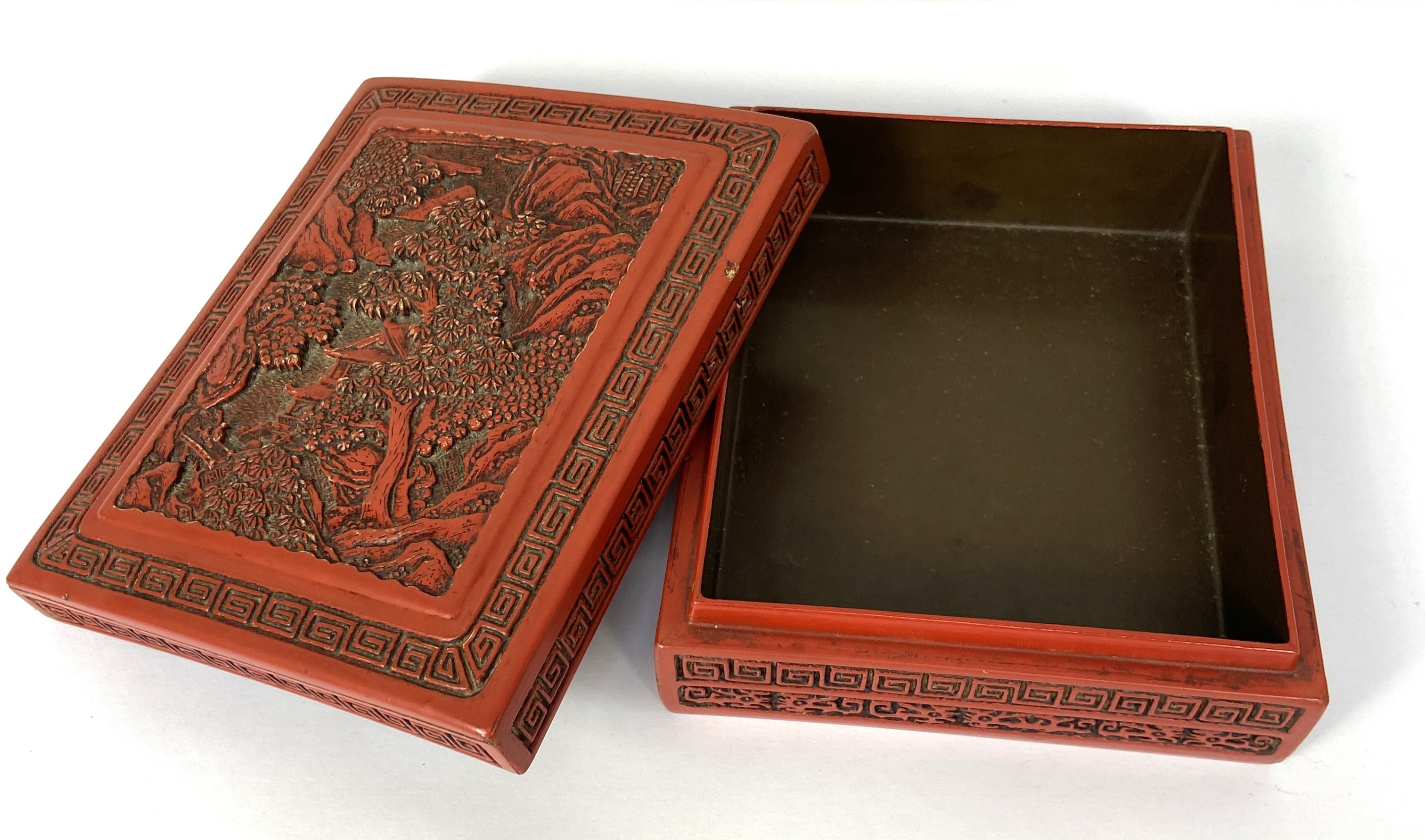 A Chinese export Cinnabar lacquered trinket box, 20th century, the top decorated with a tree lined - Image 3 of 4