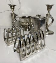 A selection of silver plate, including two toast racks, a pair of Adam style candlesticks, a two