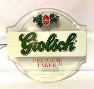 A vintage Grosch lager illuminated sign, with clear wall mount and logo