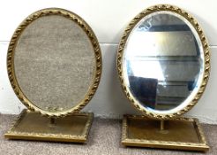 A pair of gilt framed decorative table top oval mirrors