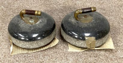 A pair of vintage Scottish curling stones, with brass and wood handles and polished tops (2)  The