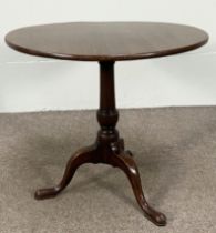 A provincial George III style mahogany wine table, 19th century, with circular top on a baluster