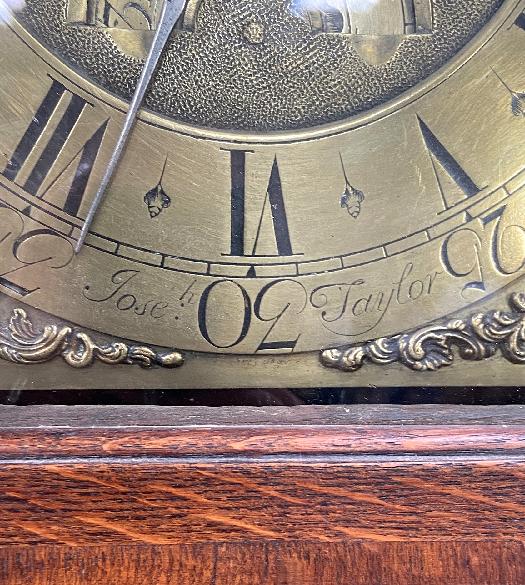 An early 18th century oak longcase clock, by Joseph Taylor, in an architectural provincial caddy - Image 5 of 8