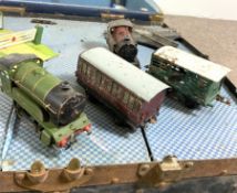 A collection of vintage model Horby type tin plate railway and assorted engines, carriages, track