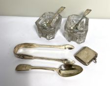 A pair of Victorian silver fiddle and shell pattern mustard spoons, together with a pair of glass