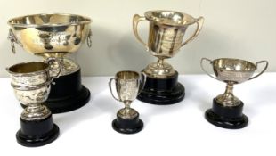 Five assorted silver sporting trophy cups, including ‘The Bogside Cup’, various dates and makers,
