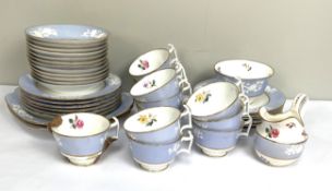 A Spode bone china tea service, with floral sprays within grey blue borders and gilt lining,