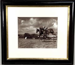 Two vintage photographs, one of 'Two girls taking a fence' and the other of a Salmon fisherman, both