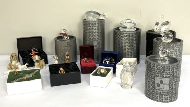 Assorted Swarovski crystal figures, including bears, in cased collectors boxes, also four small