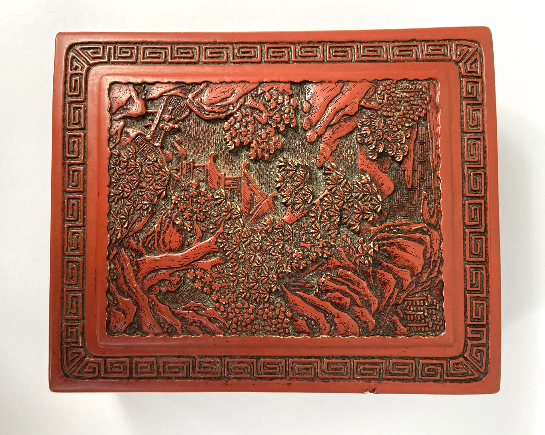 A Chinese export Cinnabar lacquered trinket box, 20th century, the top decorated with a tree lined - Image 2 of 4