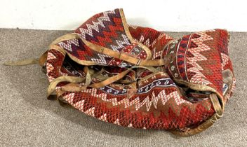 A large and colourful kilim travel bag