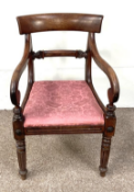 A set of five associated William IV rosewood dining chairs, with curved back rails, turned front