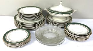A Chinastyle 'Windsor' pattern part dinner service, decorated in green and gold, with assorted