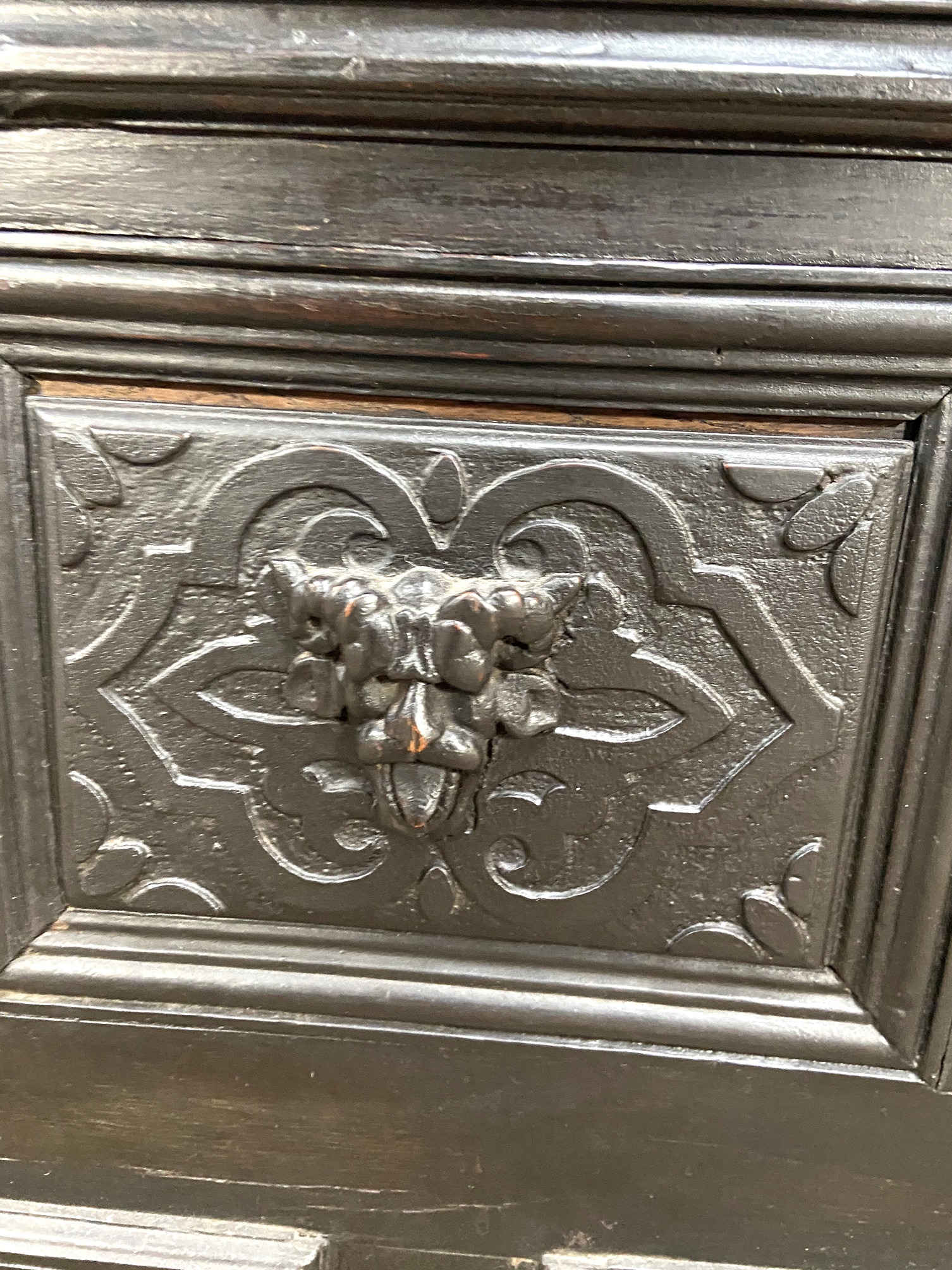 A Carolean oak coffer, 17th century and later, the front carved with moulded and divided panels, - Image 4 of 5