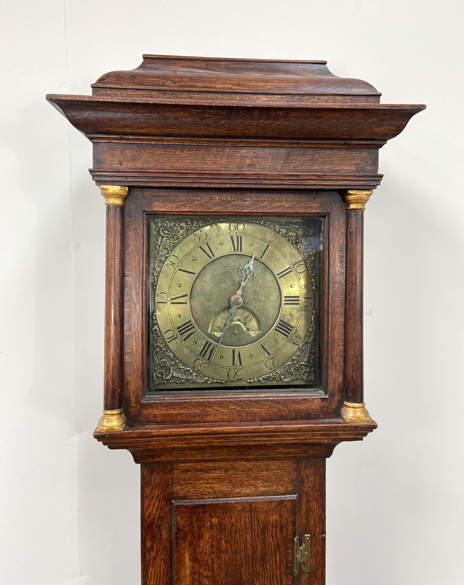 An early 18th century oak longcase clock, by Joseph Taylor, in an architectural provincial caddy - Image 2 of 8