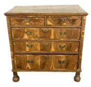 A Queen Anne figured walnut and possibly yew wood chest of drawers, early 18th century,  with a