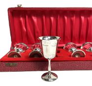 A cased set of six silver goblets, hallmarked Birmingham 1971,  each small cup with a tapered bowl