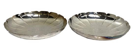 A pair of silver sweatmeat baskets, hallmarked London, 1975, each of lobed circular dished form, and