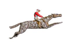 A charming Art Deco Diamond and Enamel Jockey Brooch, circa 1925, designed as a racehorse with