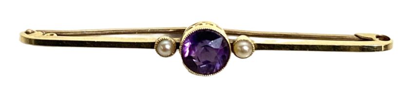 An Amethyst and Pearl brooch, early 20th century, 15 carat yellow gold setting, bar and pic,
