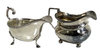 A silver sauceboat, hallmarked Sheffield 1927,  of typical form, with gadrooned rim and leaf