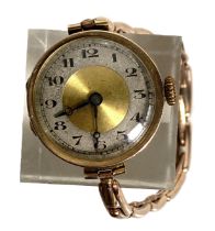 An Edwardian 9 carat gold cased dress watch, early 20th century,  with expanding gold bracelet,