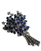 An elegant Sapphire and Diamond Spray Brooch, 20th century, set with approximately 20 Brilliant