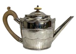 A George III silver teapot, hallmarked London 1791, by Cornelius Bland, the elegant oval part fluted