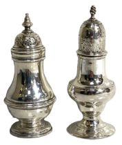 Two silver castors, including a Regency baluster castor, hallmarked London 1818, and another