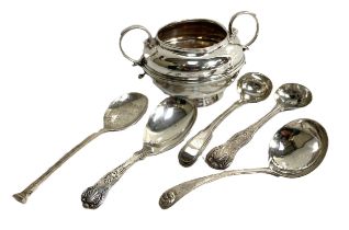 A small silver sugar bowl, hallmarked London 1921; also a five spoons, the bowl of circular form