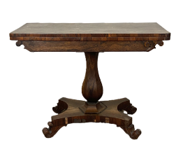 A George IV rosewood tea table, circa 1820, with a rounded rectangular fold-over top, rotating to