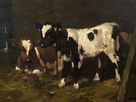 DAVID GAULD, Scottish (1836-1936), AYRSHIRE CALVES IN A BARN, oil on canvas, signed LR: D. Gauld,