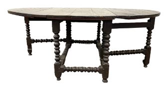 A large Charles II oak gate leg dining table, circa 1670 and later, with an oval planked top, with