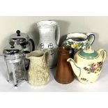 A collection of assorted ceramics, including jugs, two cake dishes, an oval ashet and other items (a