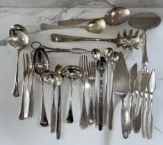 An assortment of silver plated flatware, including various servers, spoons etc. and a decorative