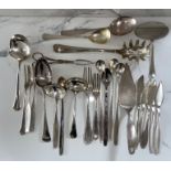 An assortment of silver plated flatware, including various servers, spoons etc. and a decorative