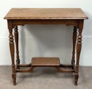 An early 20th century oak hall table, with rectangular moulded top, turned legs and united by a