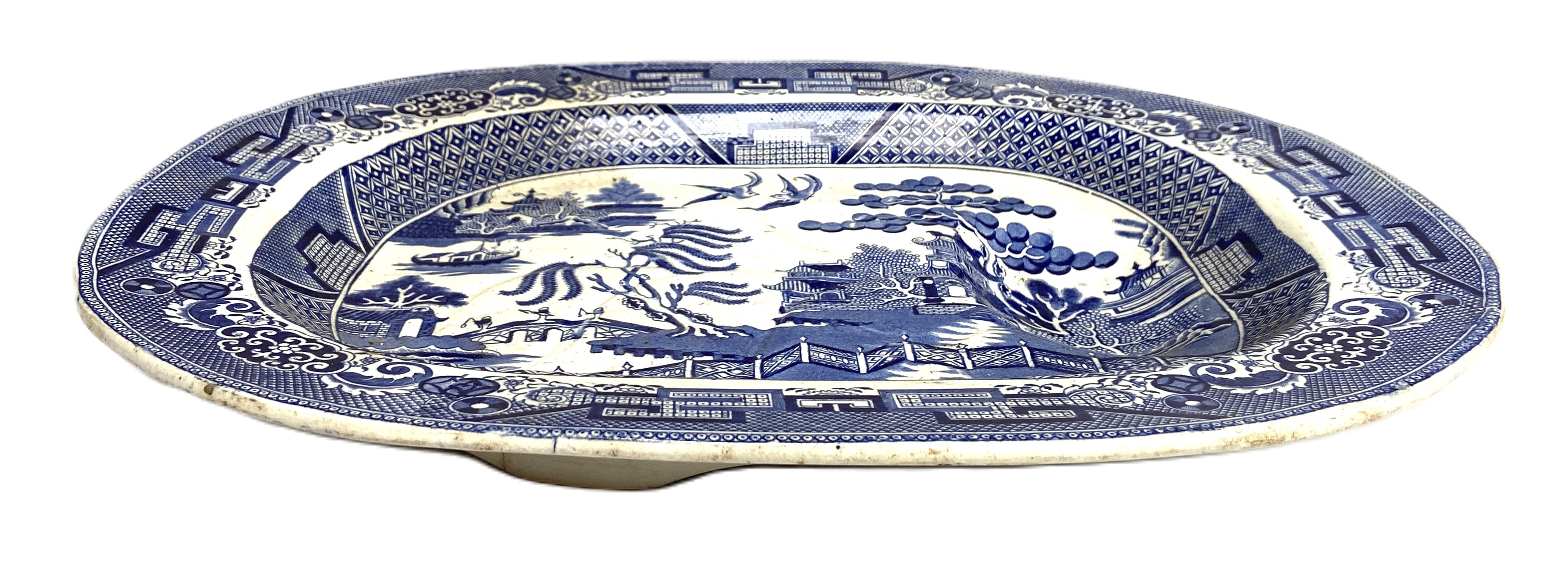 A large 19th century blue and white ‘Willow Pattern’ meat dish, by J.Meir & Sons, of typical form - Image 3 of 13