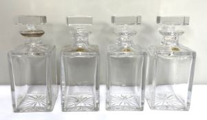 A set of four ‘Atlantis’ Lead Crystal decanters, of mallet form, together with a set of trumpet wine