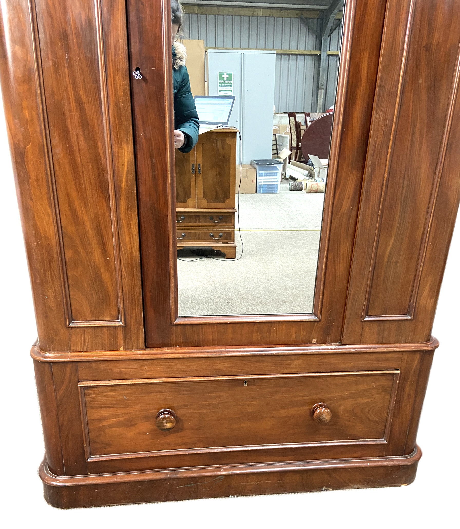 A Victorian mahogany single warbrobe, with mirrored arched door over a long drawer. (lacks - Image 3 of 6