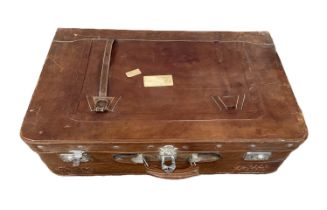 A vintage brown leather suitcase